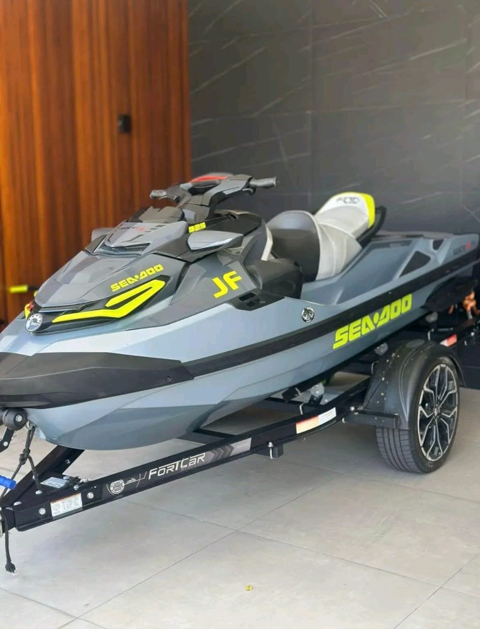 2025 Sea-Doo RXT-X 325 HP left side view on trailer ICE blue