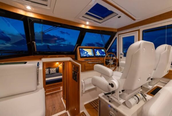 Back Cove 412 cockpit seating configuration with helm pod and navigation displays